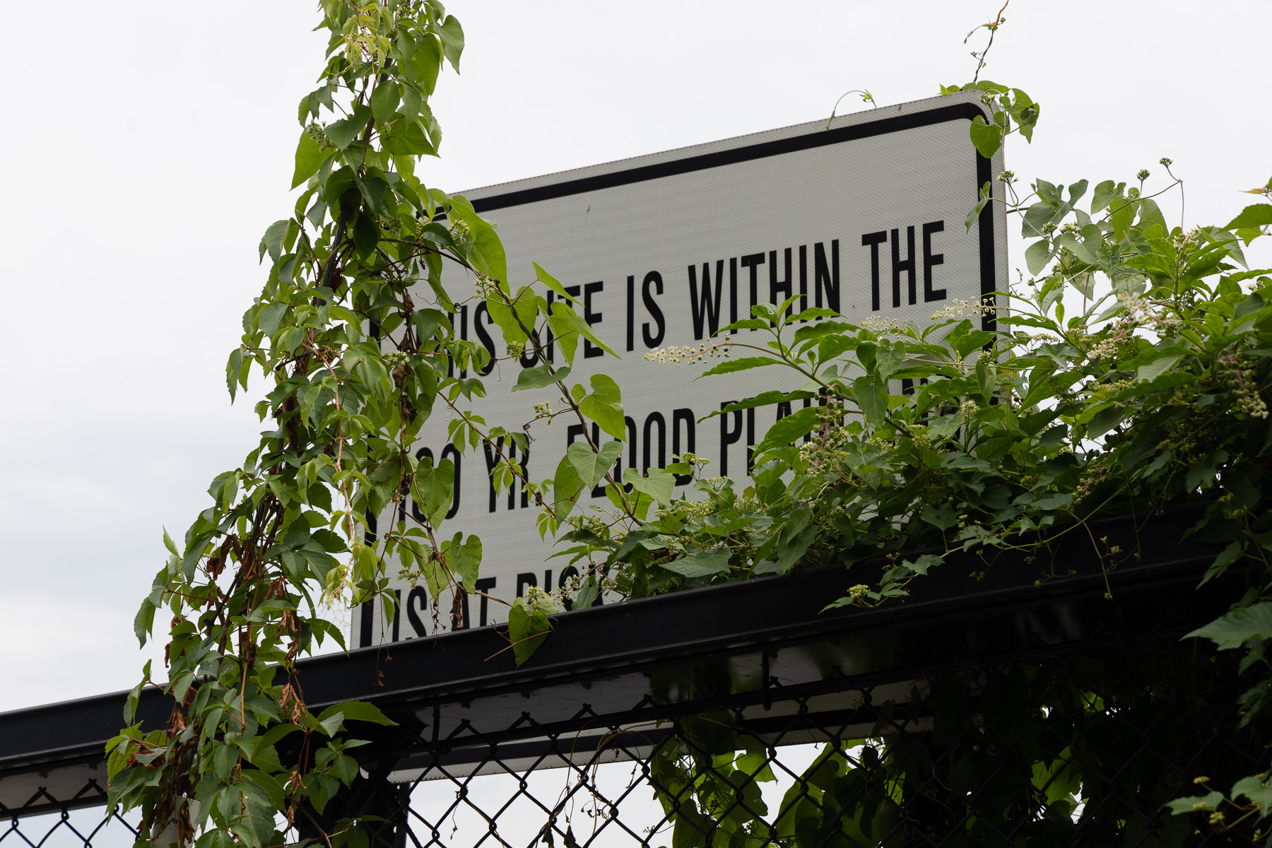 sign warning about flooding